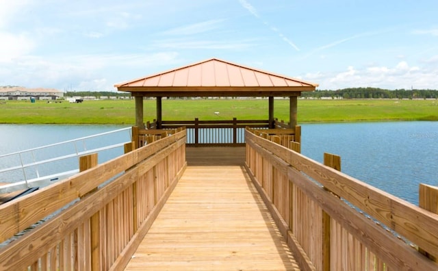 dock area featuring a water view and a gazebo