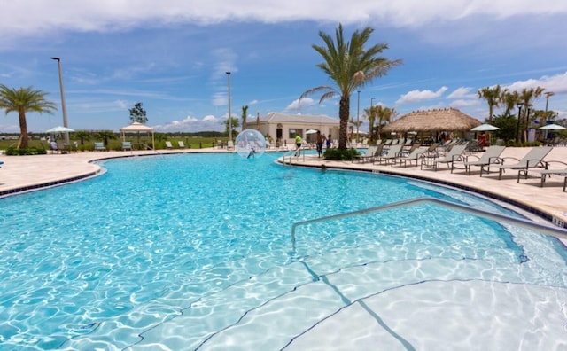 pool with a patio area