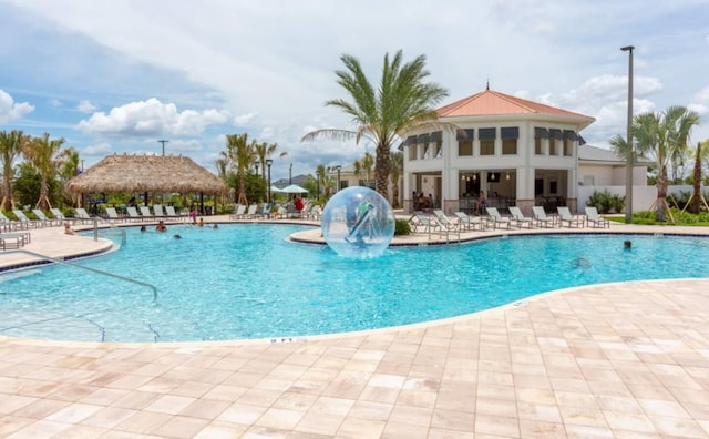 pool with a patio area