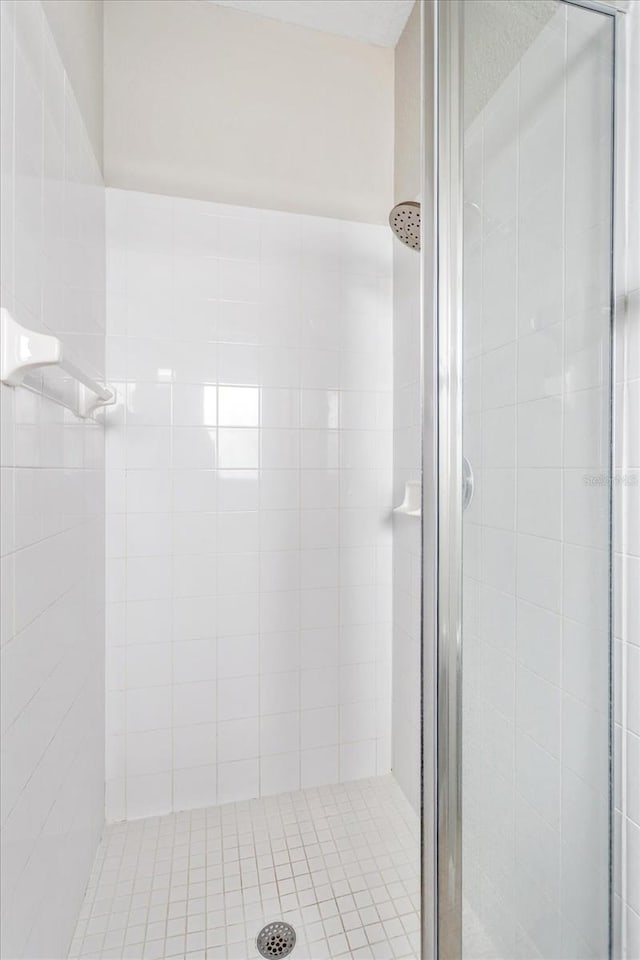 bathroom featuring a stall shower