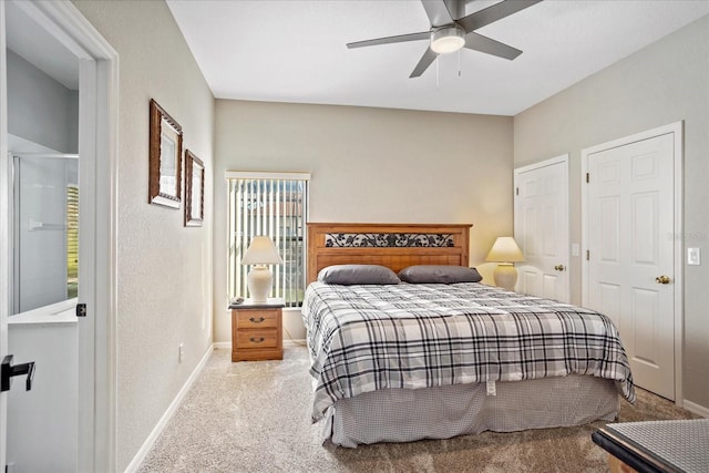 carpeted bedroom with baseboards and a ceiling fan