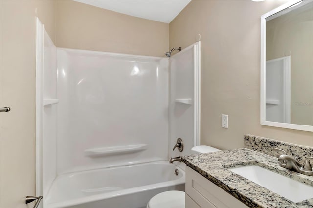 full bathroom with toilet,  shower combination, and vanity