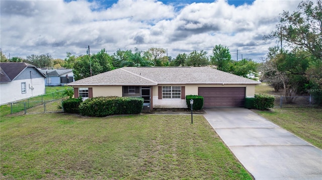 ranch-style house with stucco siding, a gate, fence, a garage, and a front lawn