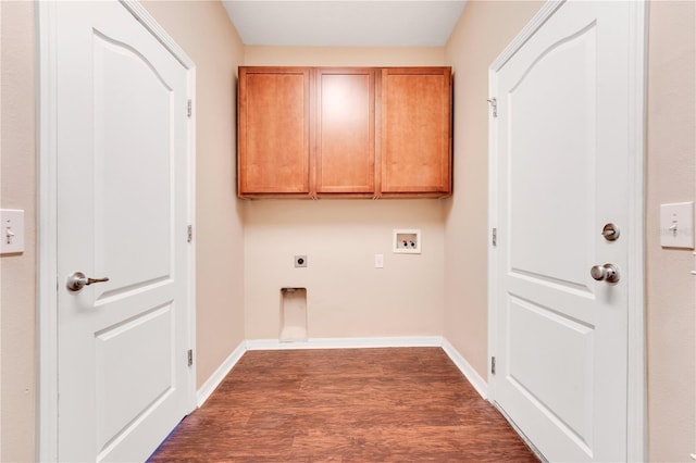 clothes washing area with dark wood-style floors, washer hookup, electric dryer hookup, and baseboards