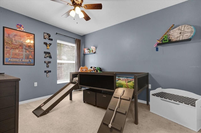 bedroom with baseboards, ceiling fan, and light colored carpet