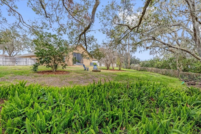 view of yard with fence