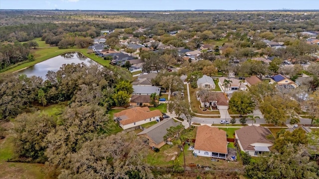 birds eye view of property with a residential view and a water view