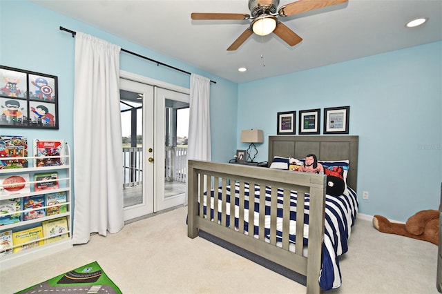 bedroom featuring recessed lighting, light colored carpet, a ceiling fan, access to exterior, and french doors