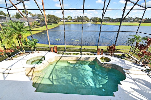 view of pool with a lanai, a water view, and a pool with connected hot tub