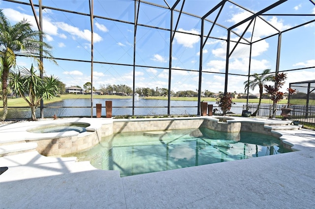 view of pool with a patio area, a water view, a lanai, and a pool with connected hot tub