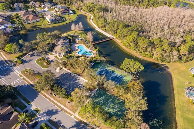 birds eye view of property featuring a water view