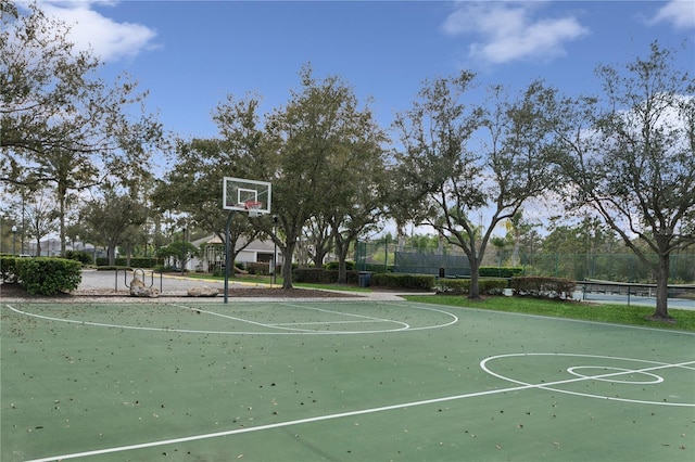 view of sport court with community basketball court and fence