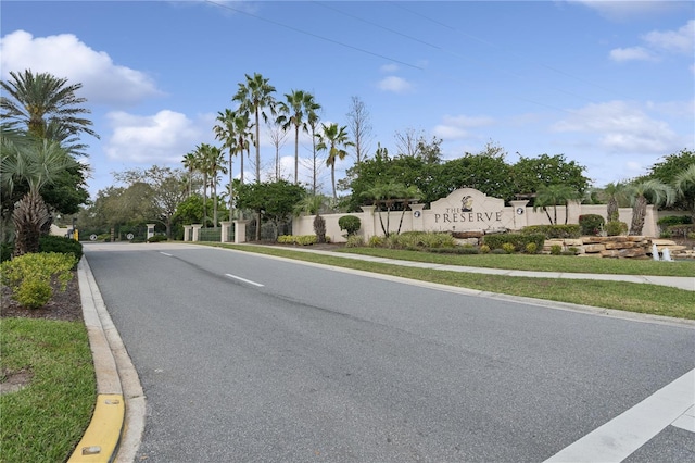 view of road featuring curbs and sidewalks