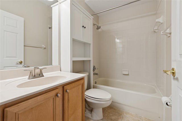 bathroom featuring vanity, shower / bathing tub combination, tile patterned flooring, and toilet