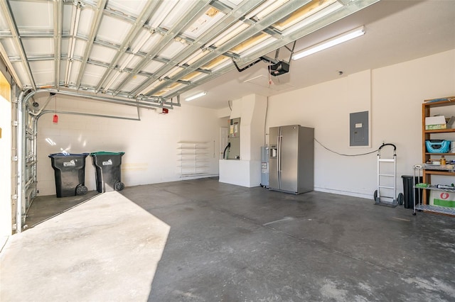 garage featuring stainless steel fridge with ice dispenser, electric panel, and a garage door opener