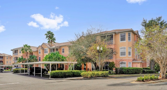 13500 Turtle Marsh Loop Unit 816, Orlando, FL 32837 - view of building exterior featuring covered parking