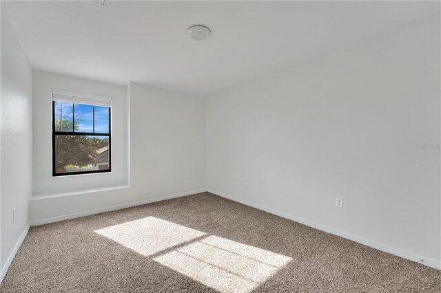 7108 Harvest Glen Ln, Riverview, FL 33578 - carpeted spare room featuring baseboards