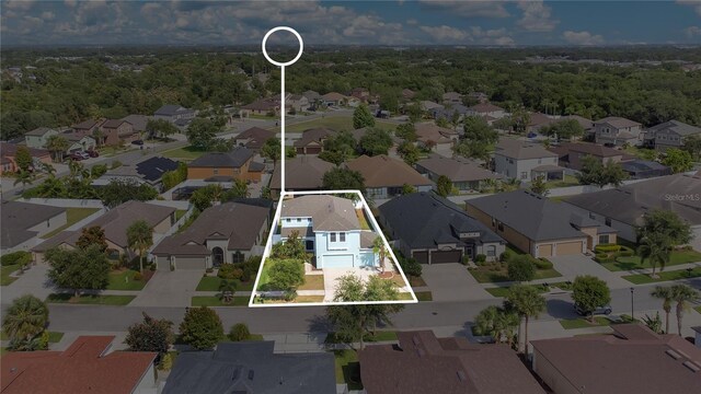 7108 Harvest Glen Ln, Riverview, FL 33578 - aerial view of residential area featuring property parcel outlined and a heavily wooded area
