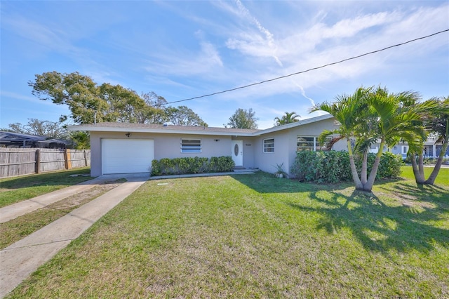 ranch-style house with stucco siding, concrete driveway, an attached garage, fence, and a front lawn