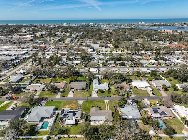 bird's eye view featuring a residential view and a water view