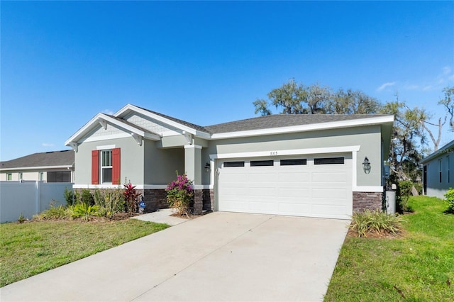 craftsman house with a garage, concrete driveway, stone siding, a front lawn, and stucco siding