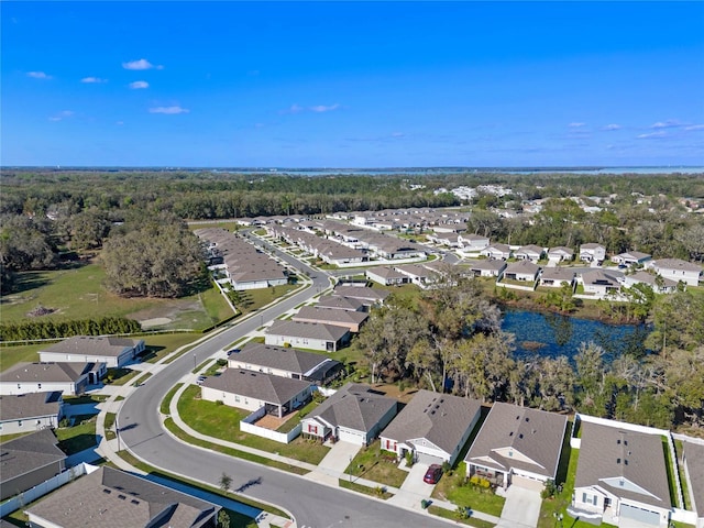 birds eye view of property with a residential view