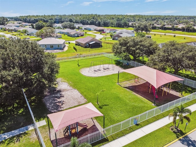 birds eye view of property with a residential view