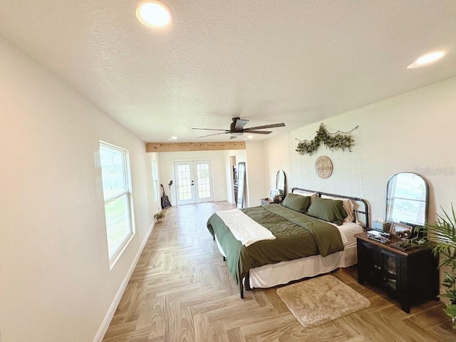 bedroom featuring baseboards, a ceiling fan, access to exterior, a textured ceiling, and french doors