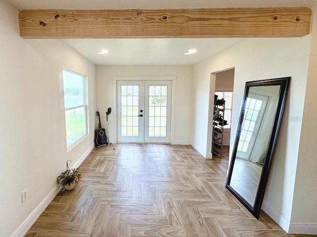 doorway with recessed lighting, french doors, and baseboards