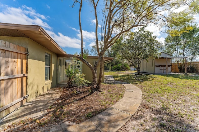 view of yard featuring fence