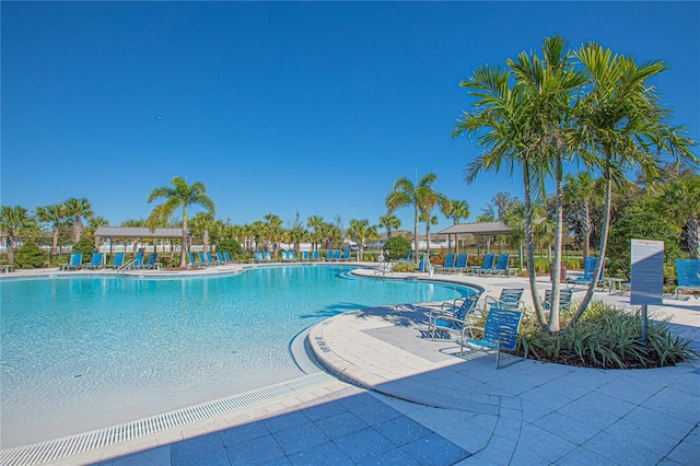 community pool featuring a patio area