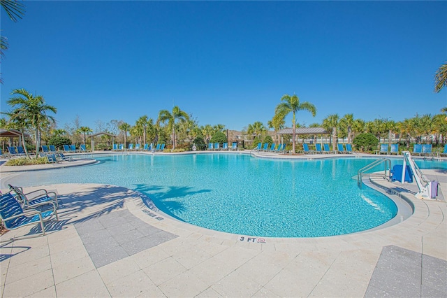 pool with a patio area