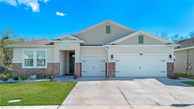 craftsman-style home featuring an attached garage, driveway, stone siding, stucco siding, and a front yard