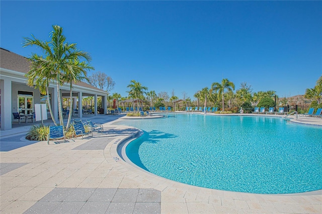 community pool with a patio