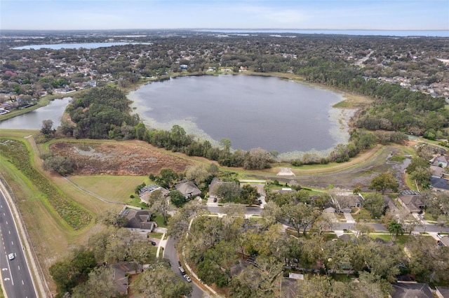 aerial view with a residential view and a water view