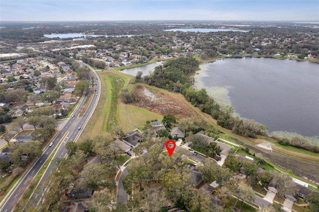 drone / aerial view with a water view