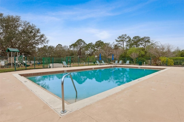 pool with fence and playground community