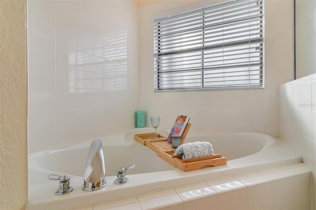 bathroom with a garden tub