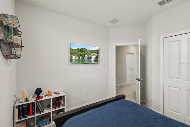 bedroom featuring carpet floors, baseboards, and visible vents