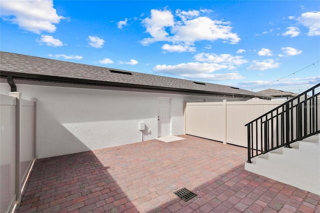 view of patio with fence