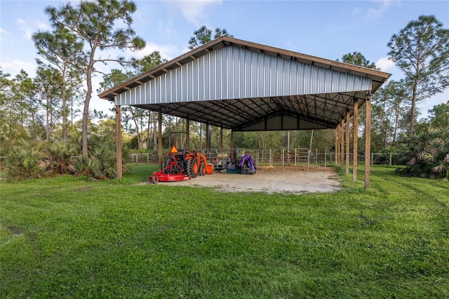 surrounding community featuring driveway, a lawn, and a detached carport