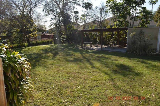 view of yard featuring fence