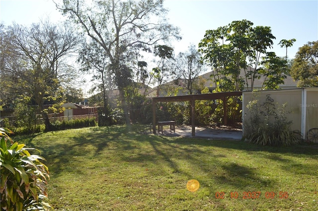 view of yard featuring fence