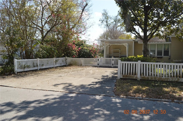 exterior space with a fenced front yard