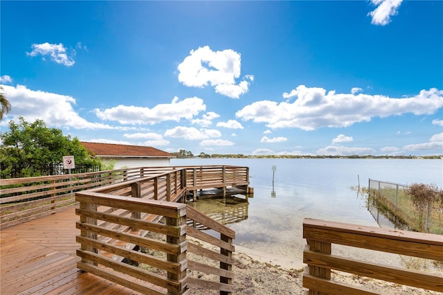 dock area featuring a water view