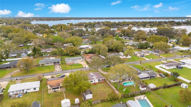 aerial view featuring a water view and a residential view