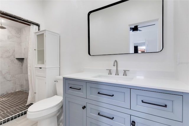 full bath with toilet, a shower stall, and vanity