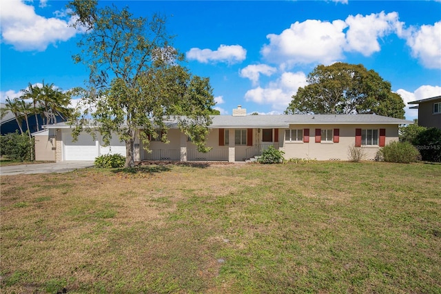 ranch-style house featuring driveway, a front lawn, a chimney, and an attached garage