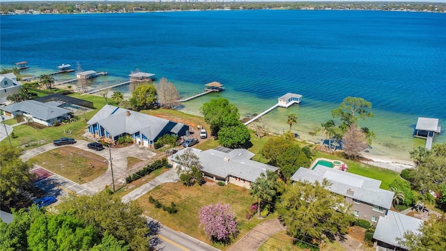 bird's eye view with a residential view and a water view