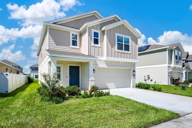 craftsman-style home featuring an attached garage, board and batten siding, fence, driveway, and a front lawn